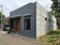 Model Rumah dengan Fasad Tembok dan Dinding Samping GRC